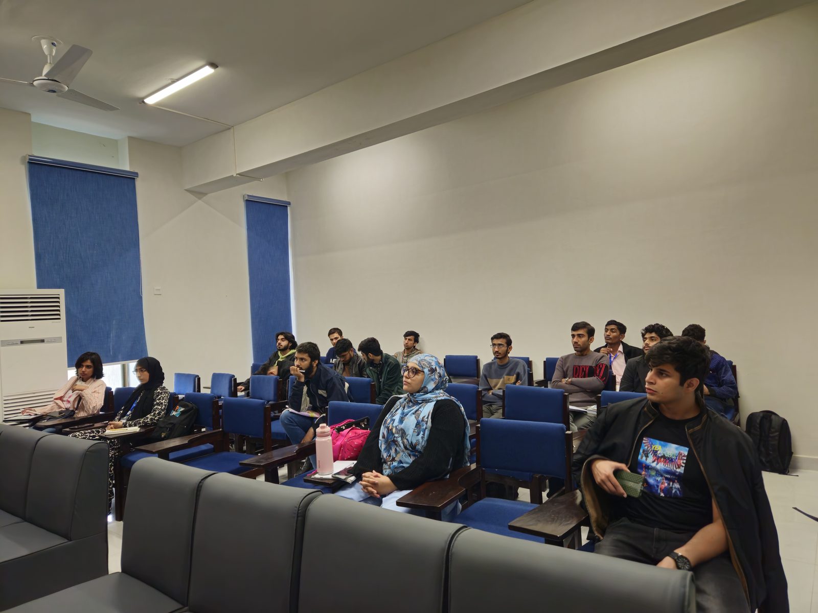 The lecture hall filling up for the opening session of Fall Fest 2025.